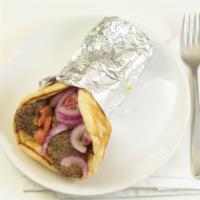 Gyro Sandwich · A seasoned blend of beef and lamb or chicken with tomato and onion in a pita tzatziki sauce ...