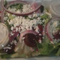 Greek Salad · Tossed greens, tomato, Greek olives, beets, sliced onions, pepperoncini, Feta cheese, and ho...