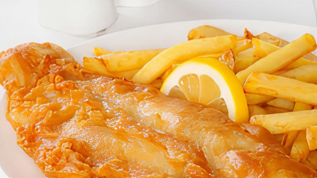 Fish & Chips · Our famous batter dipped Icelandic cod fillets served with tartar sauce and a lemon wedge with fries and soup or salad or slaw.