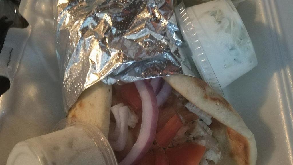 Chicken Gyro Platter · Marinated grilled chicken breast with tomato and onion served on a pita. Tzatziki sauce on the side. Served with soup, salad or coleslaw and your choice of fries or rice.
