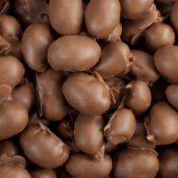 Milk Chocolate Peanuts · Extra large roasted peanuts coated twice in rich milk chocolate.