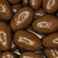 Milk Chocolate Almonds · Bite into a classic and customer favorite! Freshly roasted almonds covered in a thick and cr...