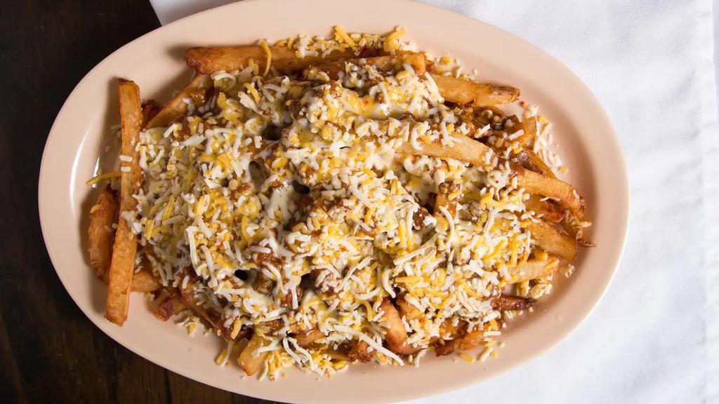 Large Chili Cheese Fries · Fresh cut fries (Tossed in our 'Ron's Seasoning Salt') topped with our homemade chili and a blend of pepper jack & American cheese
