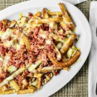 Large Bacon Cheese Fries · Fresh cut fries (Tossed in our 'Ron's Seasoning Salt') topped with a blend of melted pepper ...