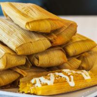 Rajas · Rajas tamales are made with sauteed onion, tomato, green bell pepper, jalapeno and mozzarell...