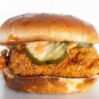 Classic Sandwich · OUR CLASSIC BUTTERMILK CHICKEN ON A TOASTED BUN WITH PICKLES , SLAW AND OUR NEW CHICK-IN SAU...