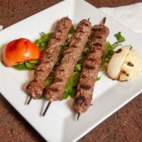Shish Kafta (3 Skewers) · Char-broiled quality lamb ground with parsley, onions and herbs.