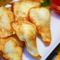 Cream Cheese Wonton · 6 pieces of Crispy wontons are stuffed with delicious cream cheese filling. Serve with sweet...