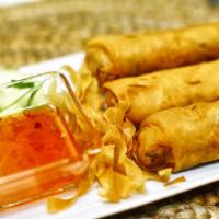 Thai Egg Rolls  (เปาะเปี๊ยะทอด) · 3 rolls of mung bean noodles cooked with cabbage, carrot, black mushroom wrapped with egg ro...