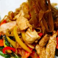 Drunken Noodles (เส้นใหญ่ผัดขี้เมา) · Spicy Thai noodle is savory, spicy and flavorful including thick noodles, bell pepper, green...