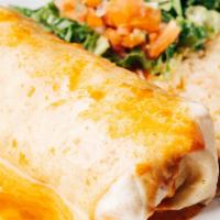 Burrito Tres Potrillos · Big burrito filled with grilled chicken and chorizo, topped with enchilada and cheese sauce,...