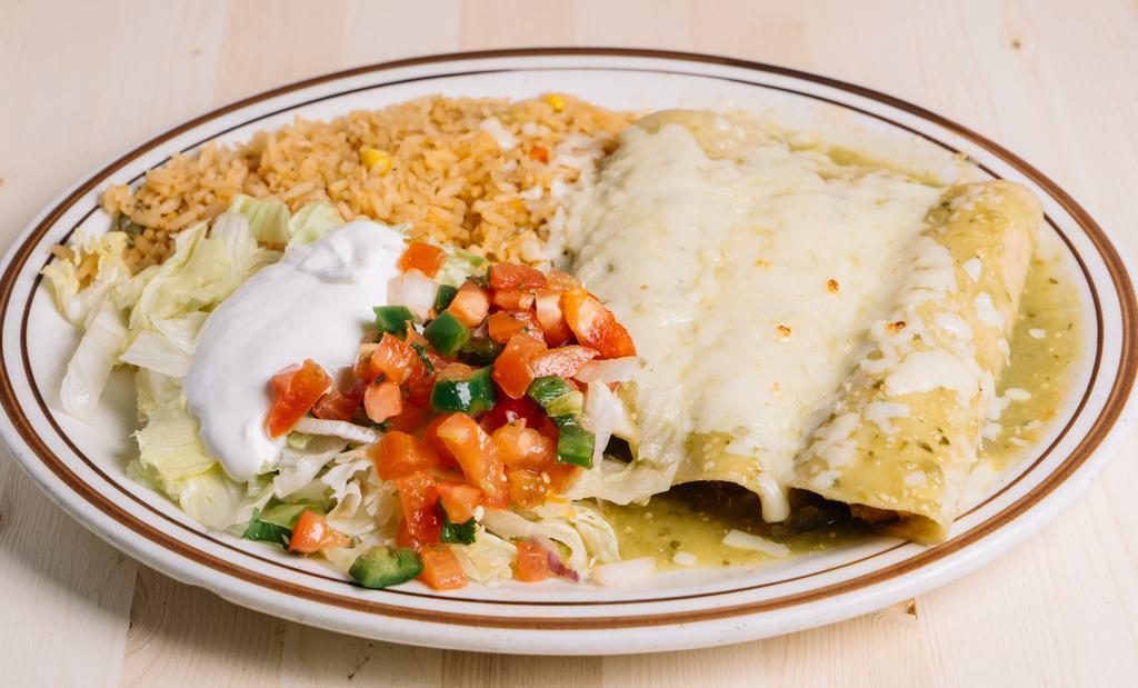 Enchiladas Verdes · Enchiladas stuffed with chicken, beef tips or cheese, topped with Verde tomatillo souce, served with Mexican rice, lettuce, sour cream and pico de pollo.
