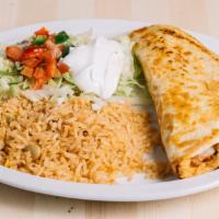 Grilled Quesadilla · Quesadilla filled with cheese and grilled chicken or steak. Served with Mexican rice, lettuc...