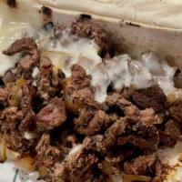 Classic Philly Footlong · House favorite with diced steak or sliced chicken, provolone, onions and green peppers on ou...