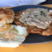 Chicken Fried Steak · Classic hand-breaded and fried steak with sausage gravy, eggs, hash browns, and toast.