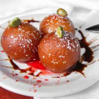 Gulab Jamun (3 Pcs) · Gluten Free. Hand made dried milk and cottage cheese balls, lightly fried and soaked in swee...