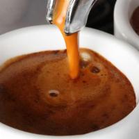 Espresso · Strong black coffee made by forcing steam through ground coffee beans.