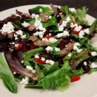 Cranberry Goat Cheese · Dried cranberries, roasted red peppers, goat cheese and candied pecans on spring greens. Ser...