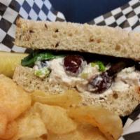 Chicken Salad Sandwich · Chicken, celery, grapes and walnuts combined with mayo, topped with mixed greens on multigra...