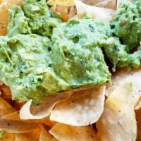 Chips & Gaucamole  · Handcrafted  guacamole coarsely mashed with  red onions, lime juice, garlic, cilantro  serve...