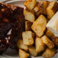 Rib Snack · 4 bones of our tender fall off the bone baby back ribs brushed with our signature BBQ sauce ...