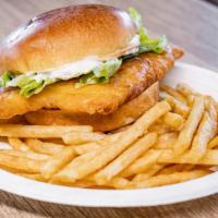 Fish Sandwich Combo · Crispy delicate Alaskan Flounder on a brioche bun topped with lettuce and tartar sauce. Serv...