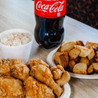 Shack Pack · 8 pieces of chicken 2 breasts, 2 wings, 2 legs and 2 thighs. With 2 sides and a 2 liter.