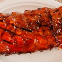 Rib Only · Eight bones of our tender fall off the bone baby back ribs brushed with our signature BBQ sa...