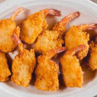 Shrimp (Only - 9 Pieces) · Nine pieces of breaded shrimp and cocktail sauce.