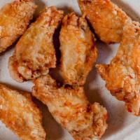 Wing Only · Eight wing dings cooked to a golden brown.