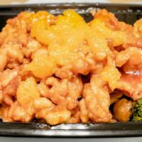 Tangerine Chicken · Chicken shredded with spicy tangerine sauce and broccoli.