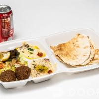 Vege Lunch Special · Combination of two falafel, two grape leaves, hummus, salad, pita bread, and free 12oz can o...