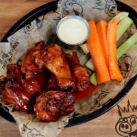 Wings · Slow smoked, juicy wings that are finished off in the fryer and tossed in your choice of sau...