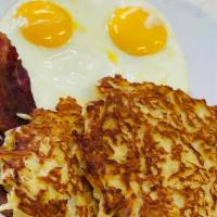 2 Eggs & Meat · Choice of double smoked bacon, sausage links, sausage patties, turkey bacon.