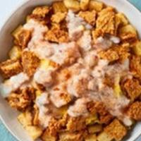 Chicken Fried Steak Bowl · Feeling country? Seasoned country potatoes topped with scrambled eggs mixed with sautéed dic...