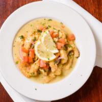 Calamari Cariera · Signature dish. Our family’s traditional recipe, sautéed squid in a lemon butter sauce with ...