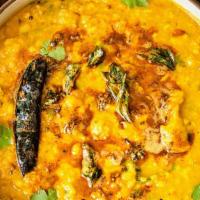 Tarka Dal · Red lentil cooked with onions, tomatoes and spices.