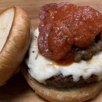 It'S A Pizza (Burger) · We add Pepperoni, Italian Sausage topped with Marinara Sauce and Mozzarella Cheese.