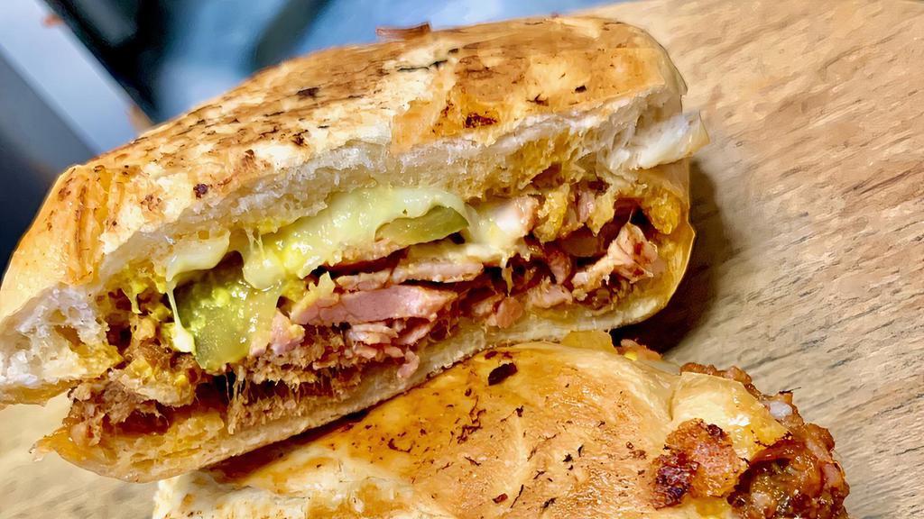 Krazy Kuban · Dearborn Ham and bbq pulled pork with pickles white cheddar/mozzarella and mustard