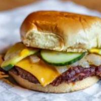 Moes Special Smash Burger · 2 of our special blend patties with bacon blended right into the patty, between a brioche bu...
