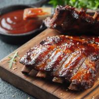 Slab Alani'S Ribs (1/3) · 4 bones of our famous grilled ribs. Pair with our house made barbecue sauce for finger-licki...