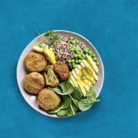 Veggie Falafel Dinner Bowl · These ultimate veggie falafels, pita, and herbs dressed with seasonings.