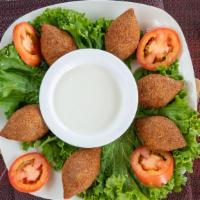 Fried Kibbee (Balls) · sautéed meat, onion, almonds, seasoning, roll up with mix with cracked wheat. served FRIED.