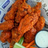 Full Order Bone-In Broasted Wings · Crispy, Juicy, And Freshly Cooked To Order. Served ranch or bleu cheese (each extra/ .75)