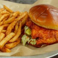 Hot Chicken Sandwich · Our juicy broasted chicken breast topped with sweet. chili coleslaw and house pickles served...