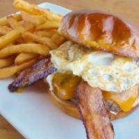 Hangover Burger · Bacon, fried egg, lettuce, tomato, onion, choice of cheese; served with your choice of side.