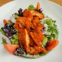 Buffalo Chicken Salad · Buffalo tossed chicken, romaine and mixed greens, celery, tomatoes, and red onions tossed wi...