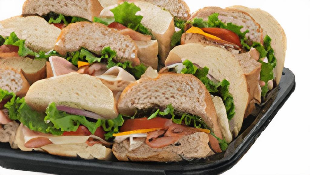 Small Signature Sub Tray · 12 - 4 inch subs, with a mixture of our signature Penny Club, Italian and Original subs and assorted cheeses