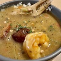 Sebastian'S Gumbo · A bowl of Southern favorite of shrimp, crab, and Cajun sausage over rice served with cornbre...