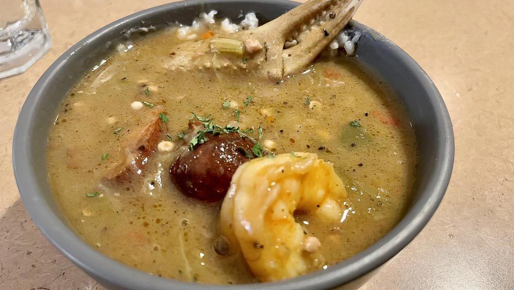 Sebastian'S Gumbo · A bowl of Southern favorite of shrimp, crab, and Cajun sausage over rice served with cornbread muffin.